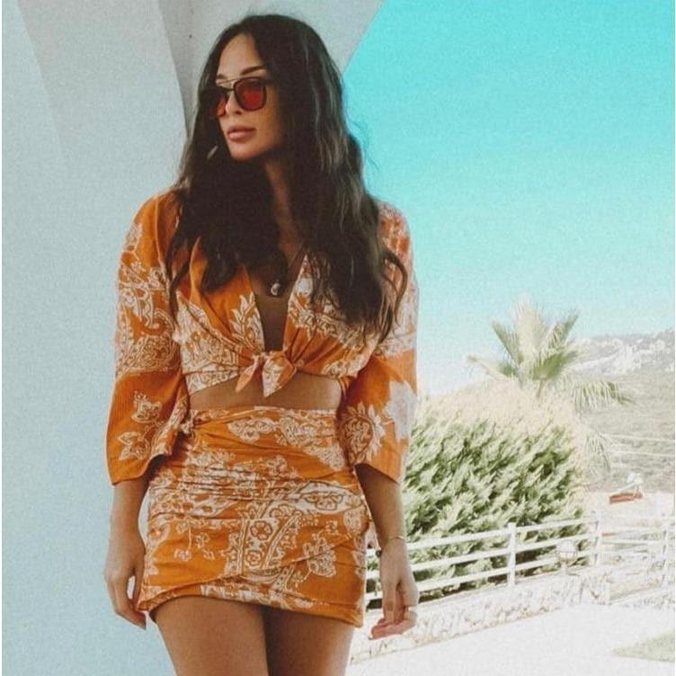 orange paisley print ruched top and high waist skirt