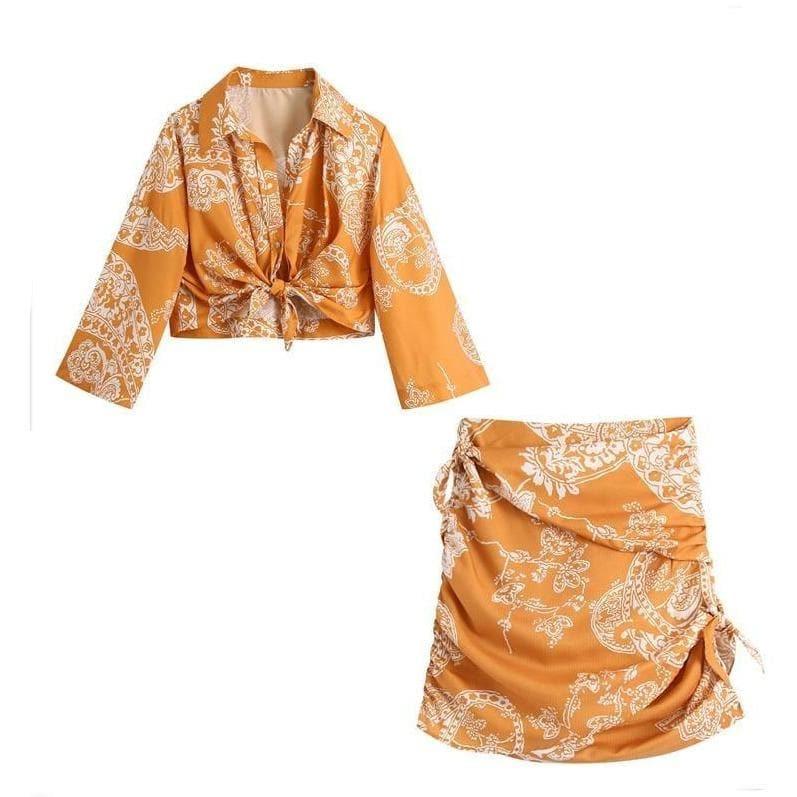 orange paisley print ruched top and high waist skirt