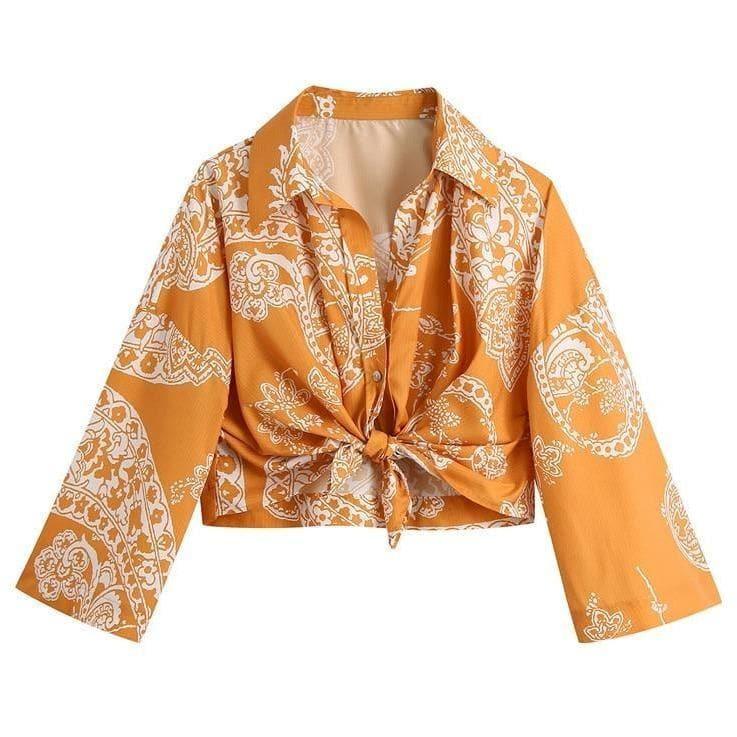 orange paisley print ruched top and high waist skirt