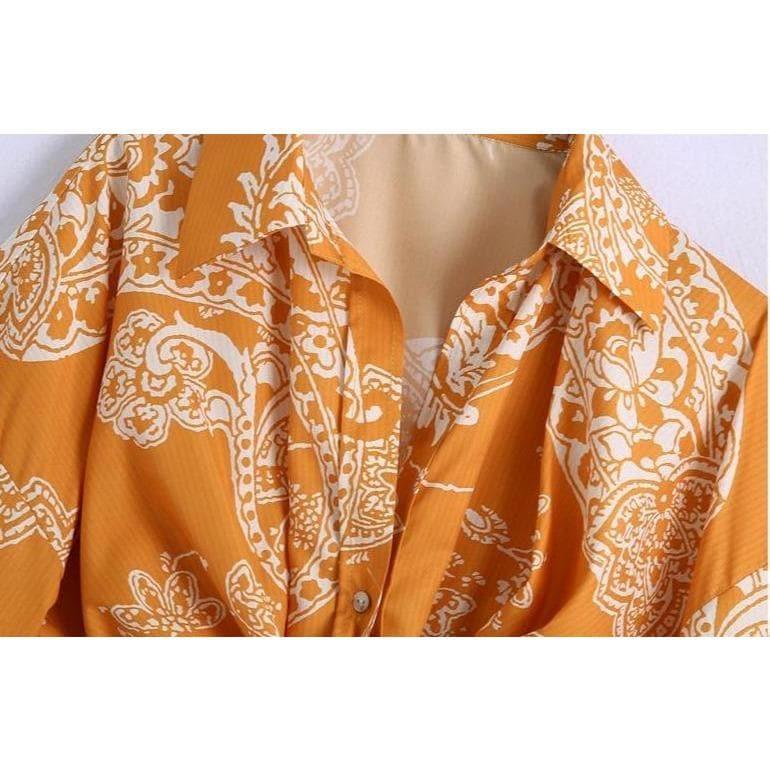 orange paisley print ruched top and high waist skirt