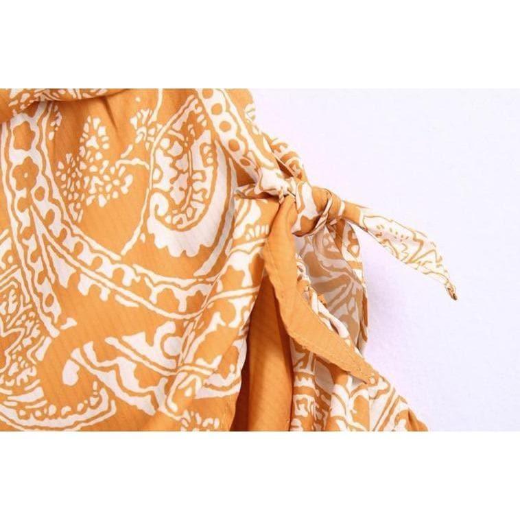 orange paisley print ruched top and high waist skirt