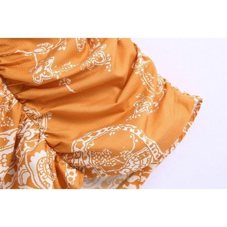 orange paisley print ruched top and high waist skirt