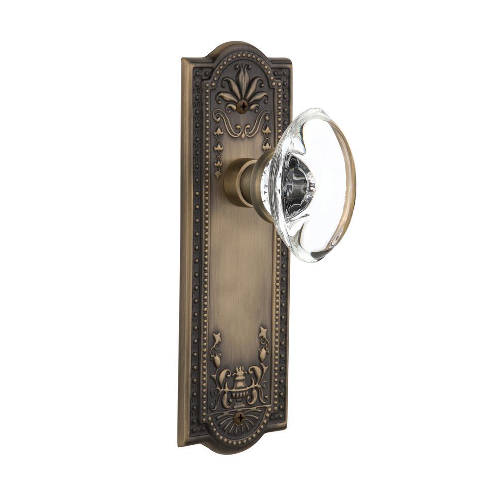 Meadows Plate 2-3/8 in. Backset Antique Brass PassaHall/Closet Oval Clear Crystal Glass Door Knob