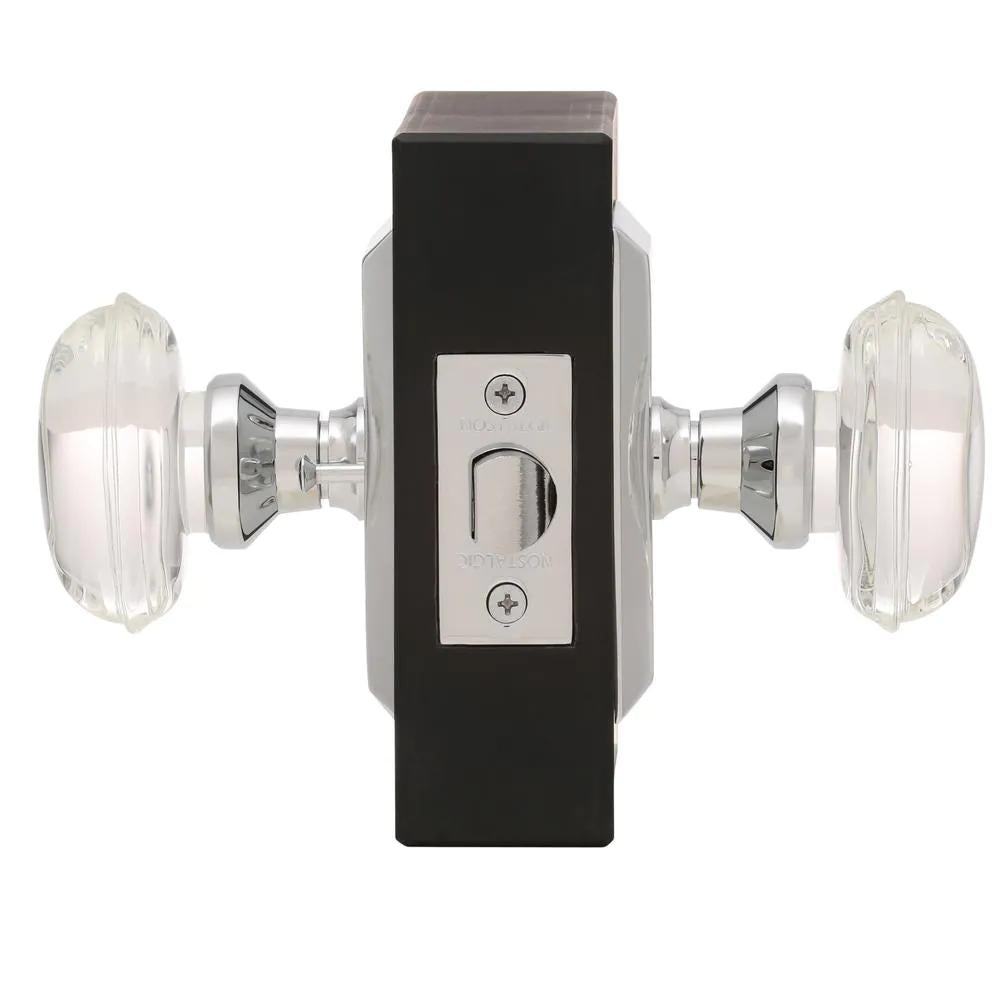 Studio Plate 2-3/8 in. Backset Bright Chrome Privacy Bed/Bath Oval Clear Crystal Glass Door Knob