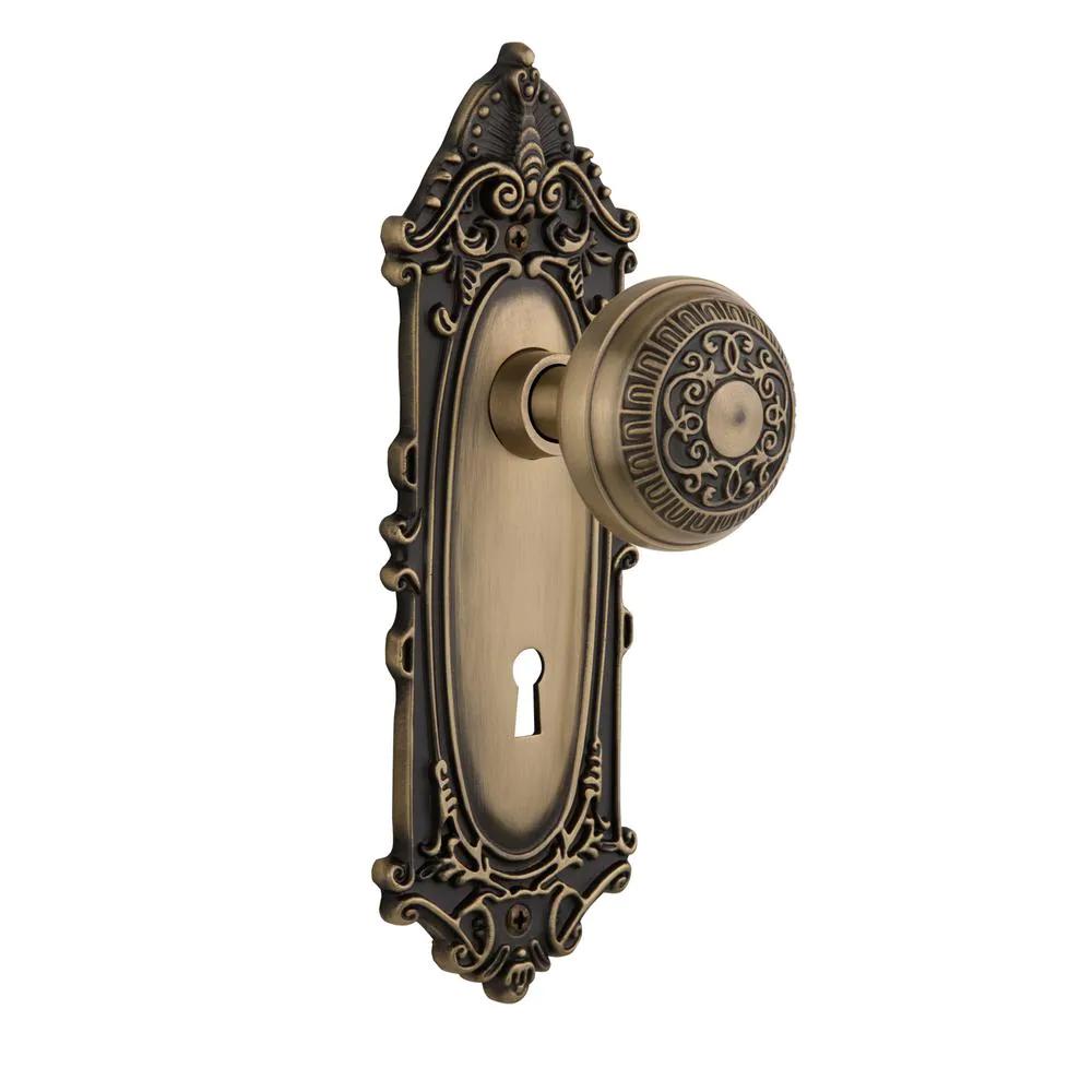 Victorian Plate with Keyhole 2-3/8 in. Backset Antique Brass Privacy Bed/Bath Egg and Dart Door Knob
