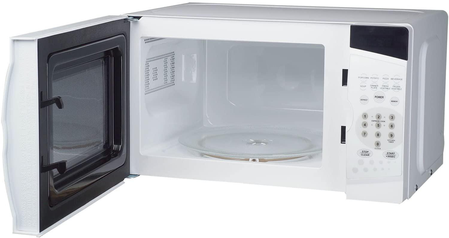 Magic Chef 0.7 Cu. Ft. 700W Oven in White Countertop Microwave. 7