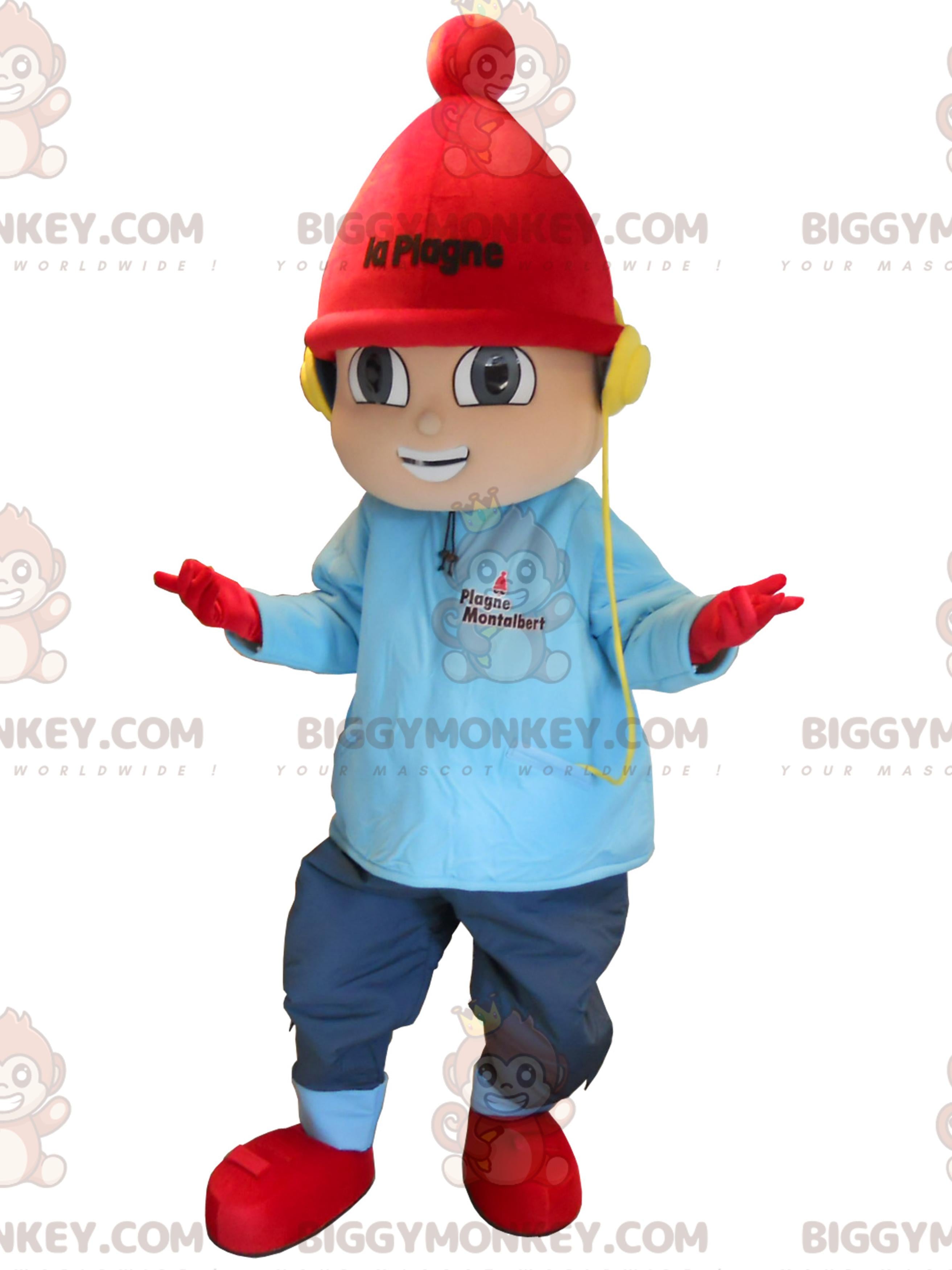 Little boy BIGGYMONKEYmascot costume dressed in winter gear. La Plage