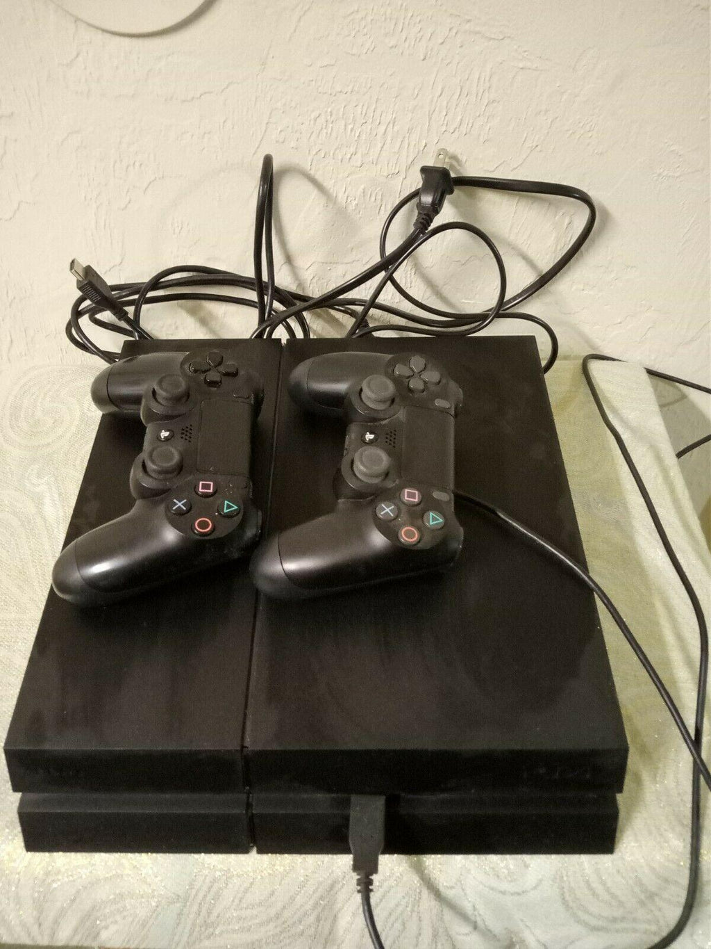 Playstation 4 with 10 games and extra wireless controller with original box Sony