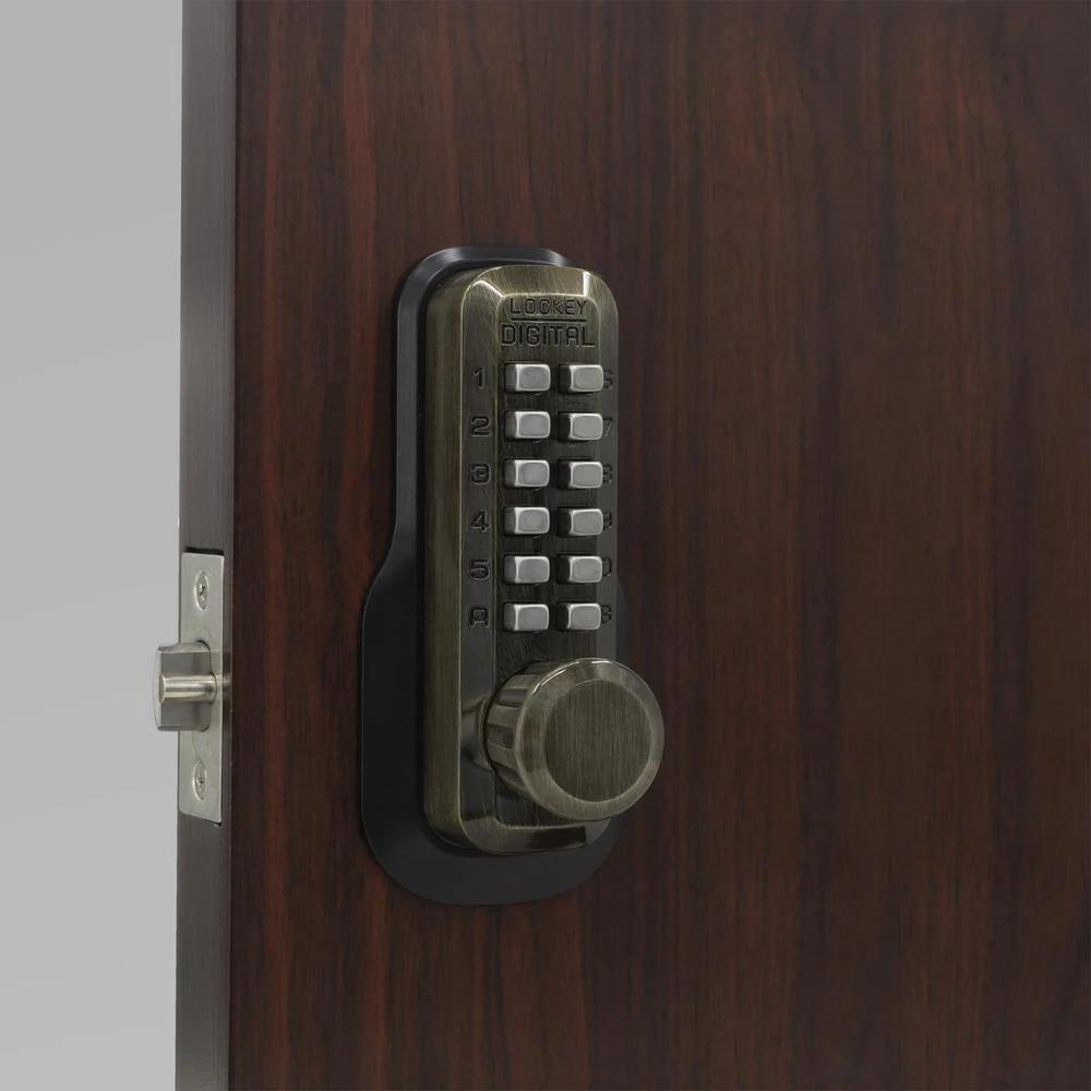 M230-DC Antique Brass Mechanical Keyless 5 in. L x 1-1/2 in. W x 1-7/8 in. D Storeroom Knob w/DeadlocSpring Latch