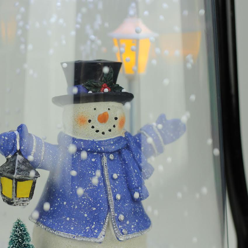 Northlight 13.5 in. Lighted Musical Snowman with Lantern Snowing Christmas Tabletop Lantern