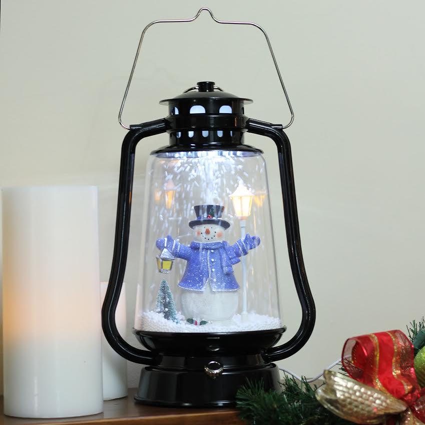 Northlight 13.5 in. Lighted Musical Snowman with Lantern Snowing Christmas Tabletop Lantern