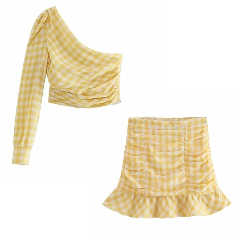 one shoulder crop top and plaid ruched skirt