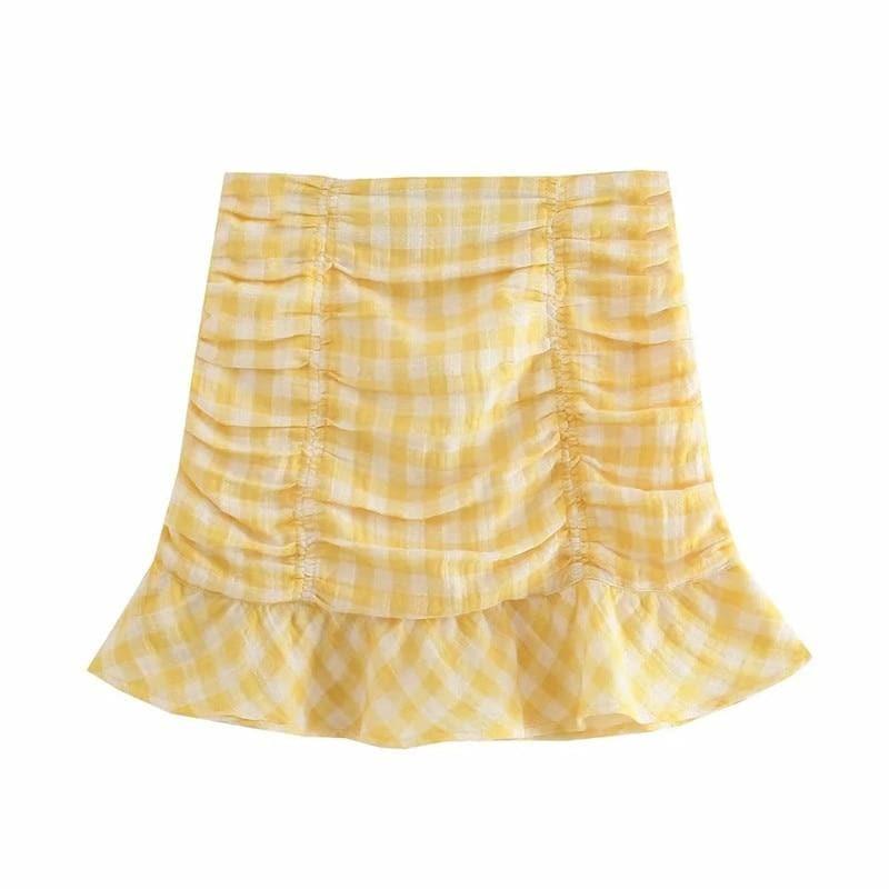 one shoulder crop top and plaid ruched skirt
