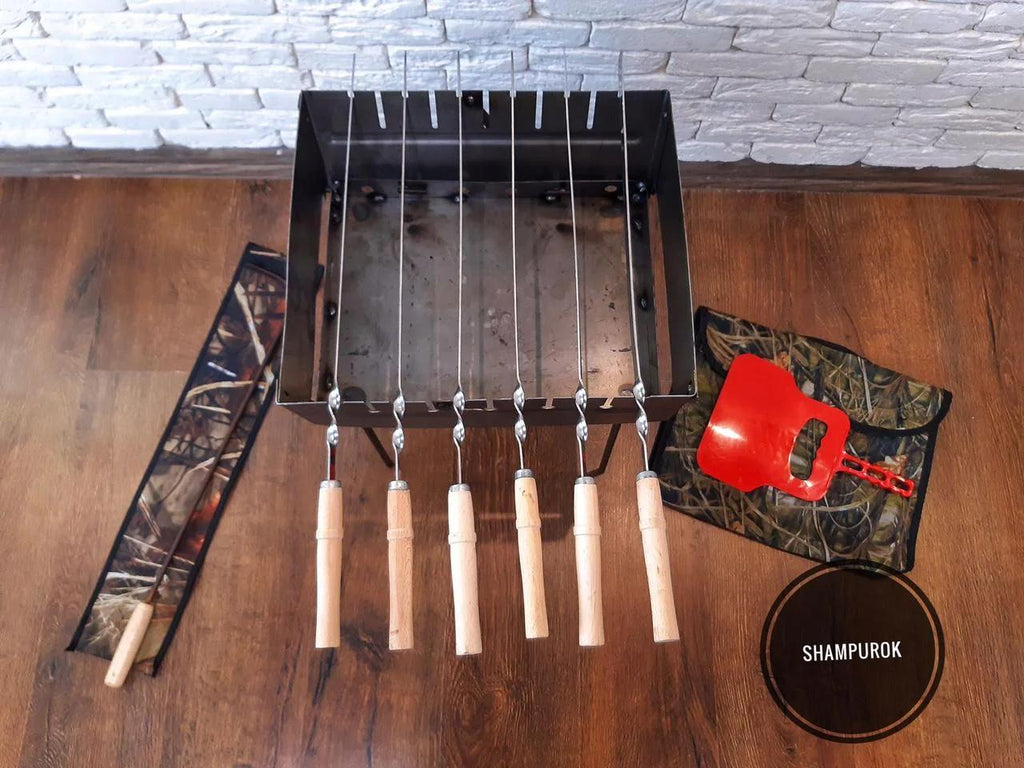 Barbecue-a folding suitcase Grill Barbecue Set (barbecue,skewers, fan,fire iron)