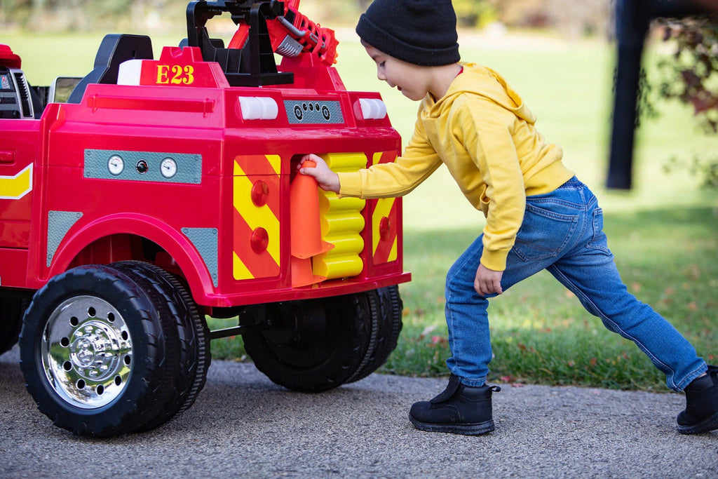 RAM 3500 Fire Truck Ride-On Toy Car by Kid Trax, red