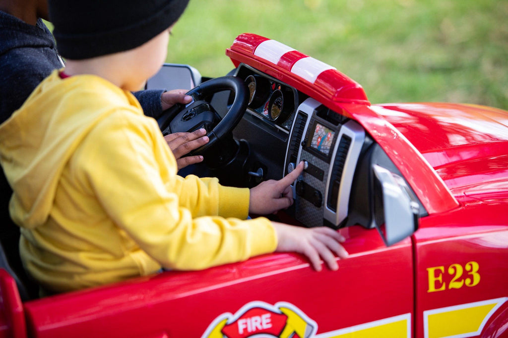 RAM 3500 Fire Truck Ride-On Toy Car by Kid Trax, red