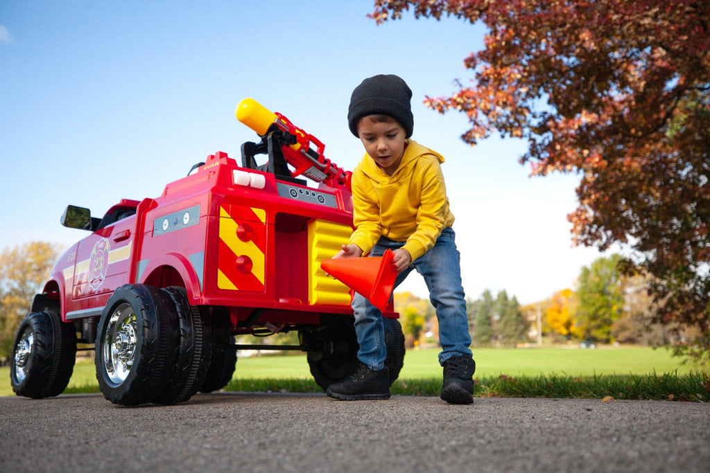 RAM 3500 Fire Truck Ride-On Toy Car by Kid Trax, red
