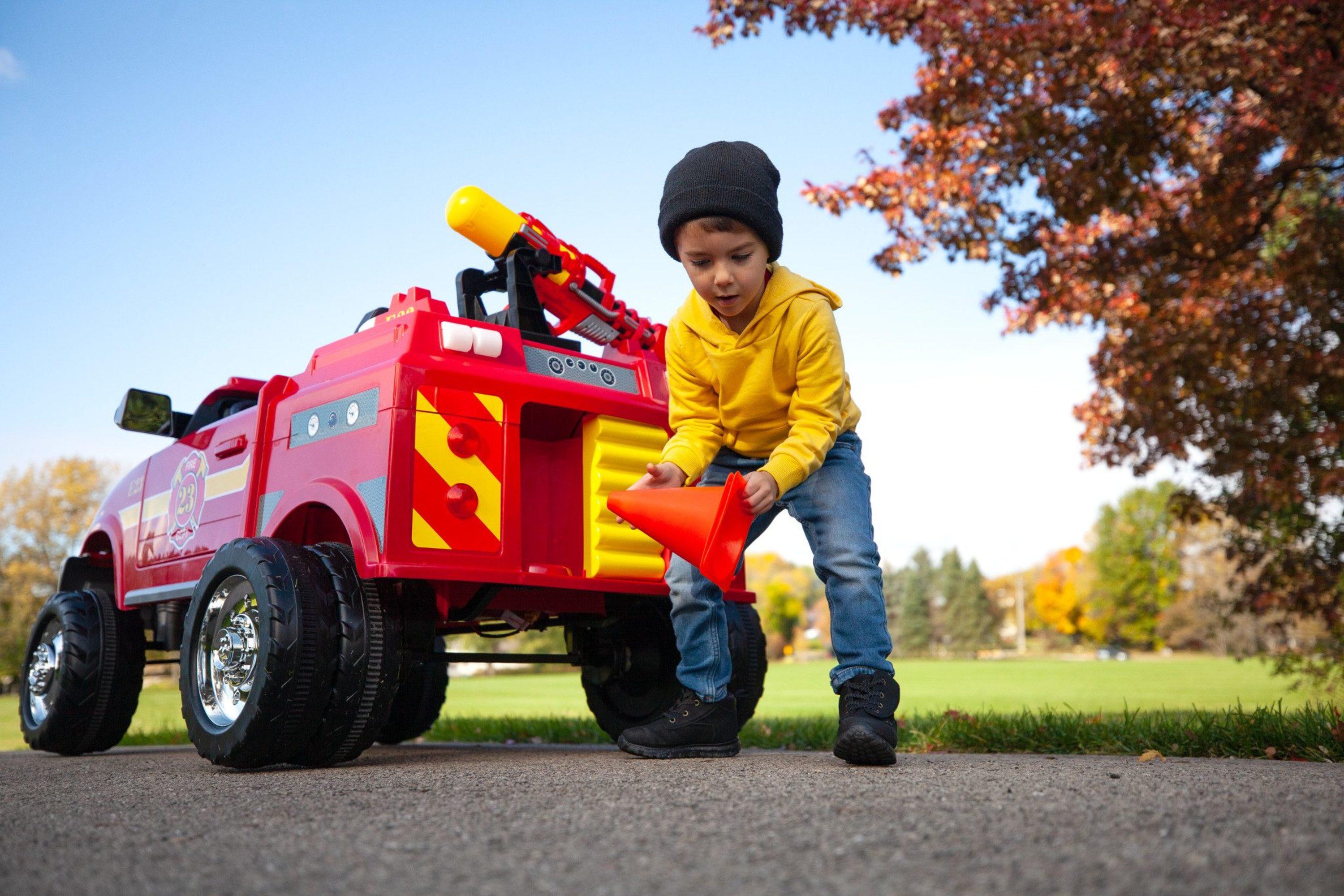 RAM 3500 Fire Truck Ride-On Toy Car by Kid Trax, red