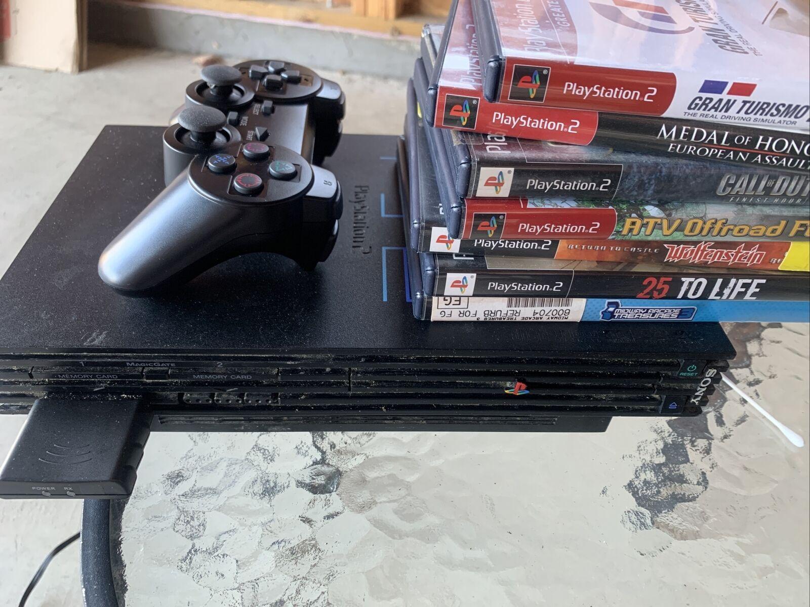 Sony PlayStation 2 Plus 7 Games Control And Cords