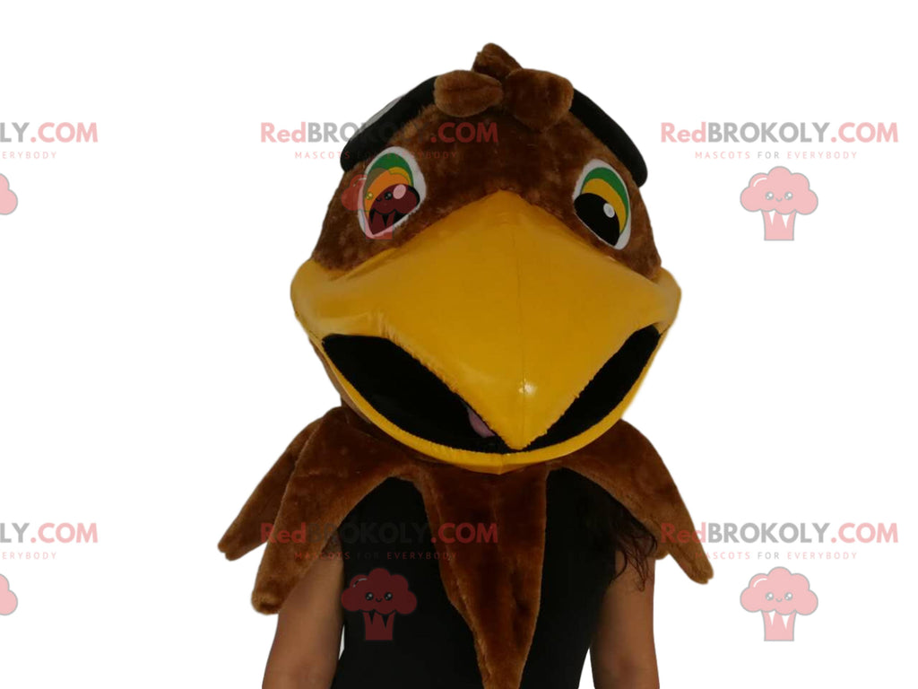 Brown eagle head mascot. Eagle head costume