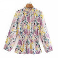 mock neck shirred waist ruffle blouse
