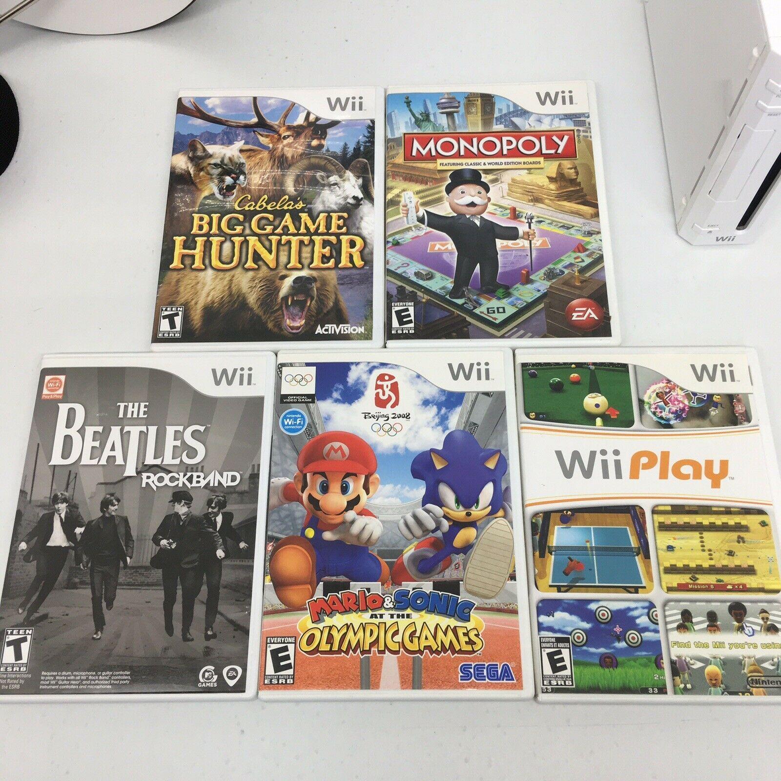 Wii Bundle w/ 5 games, 2 Controllers, 1 Guitar, Super Mario video games