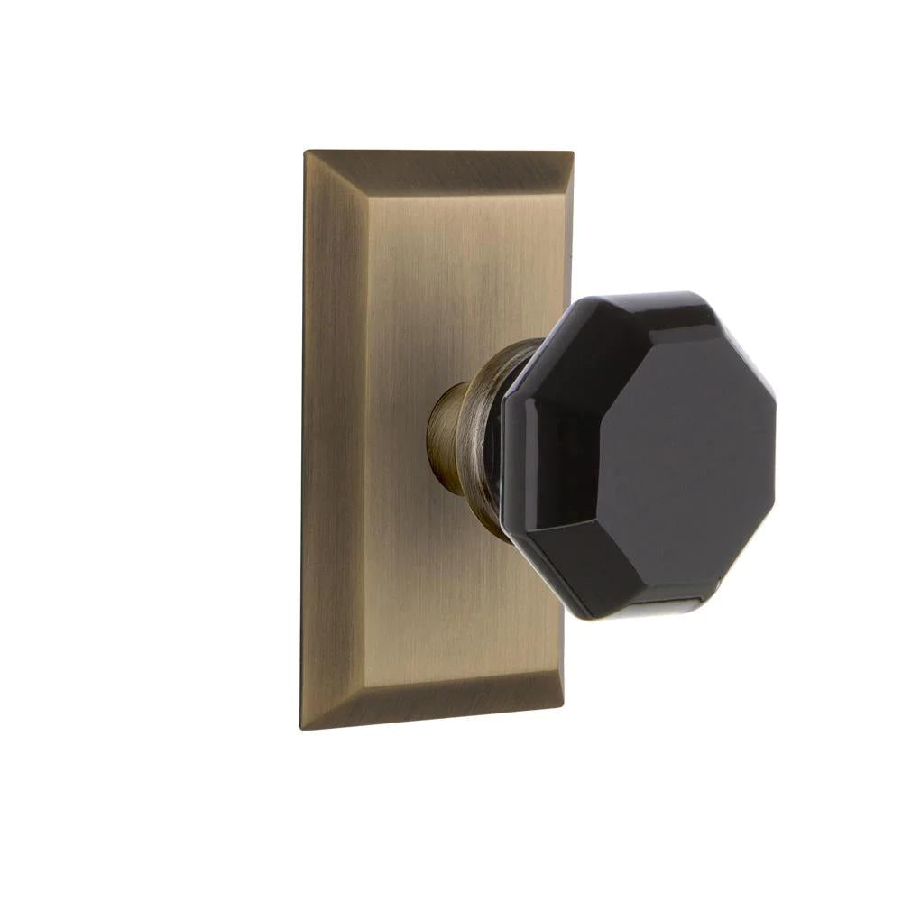 Studio Plate 2-3/8 in. Backset Antique Brass PassaHall/Closet Waldorf Black Door Knob