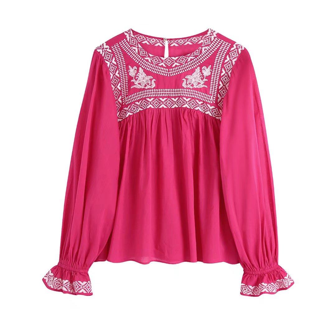 pink pleated blouse