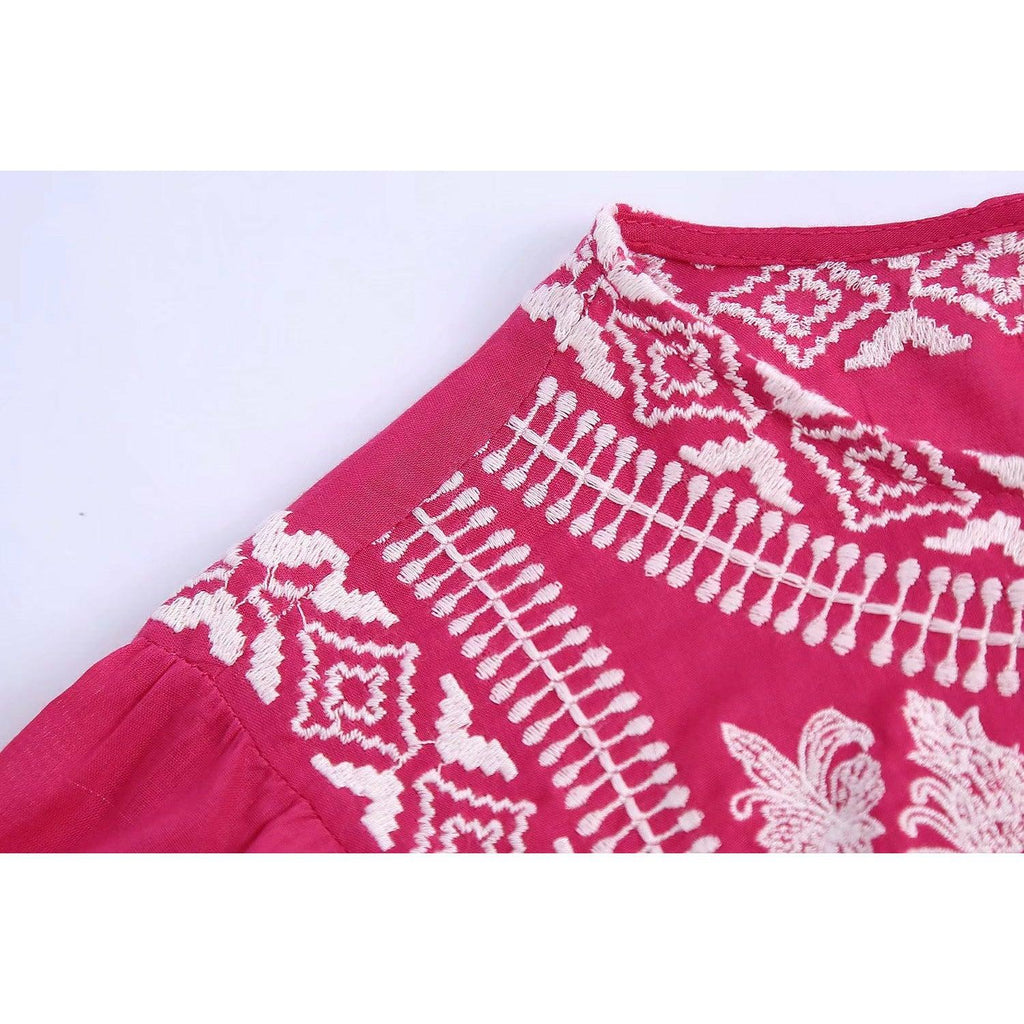 pink pleated blouse