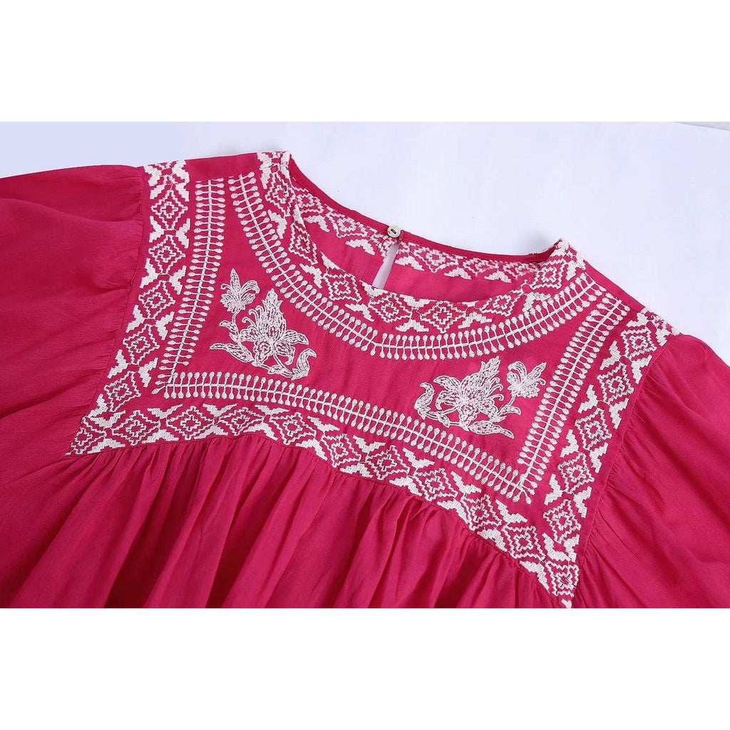 pink pleated blouse