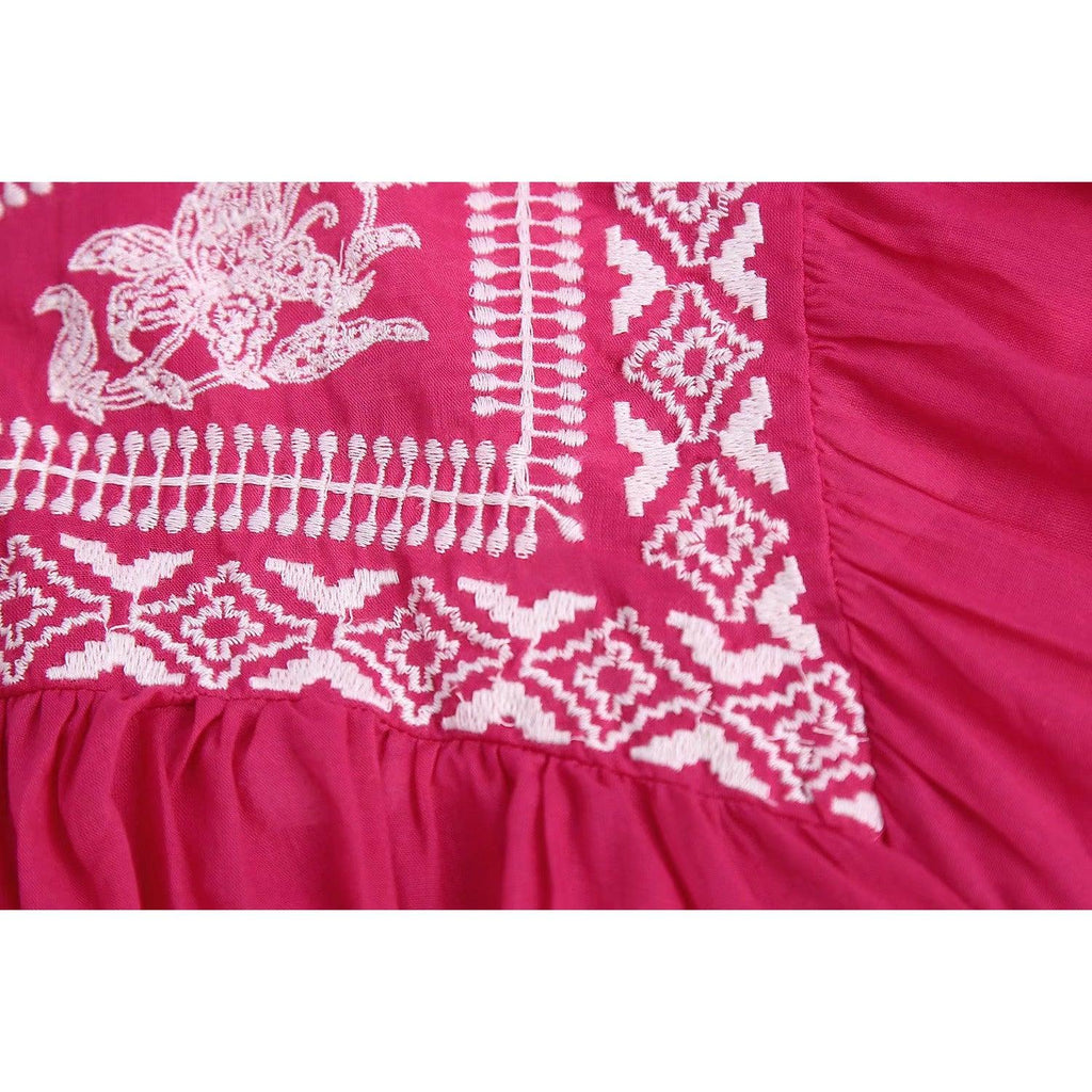 pink pleated blouse