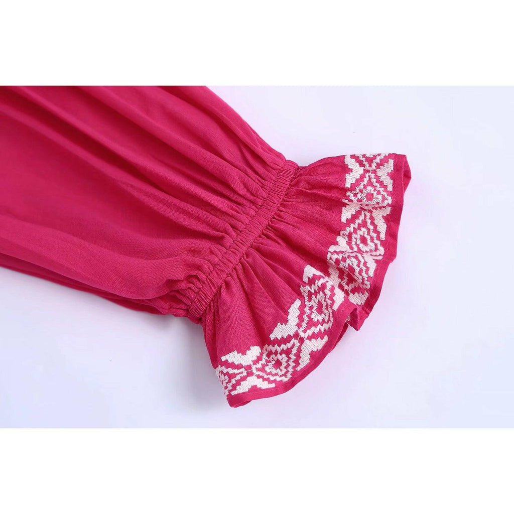 pink pleated blouse