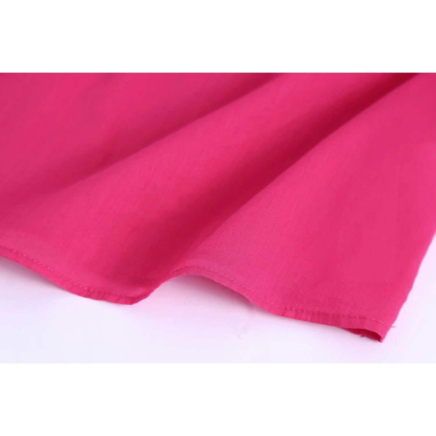 pink pleated blouse