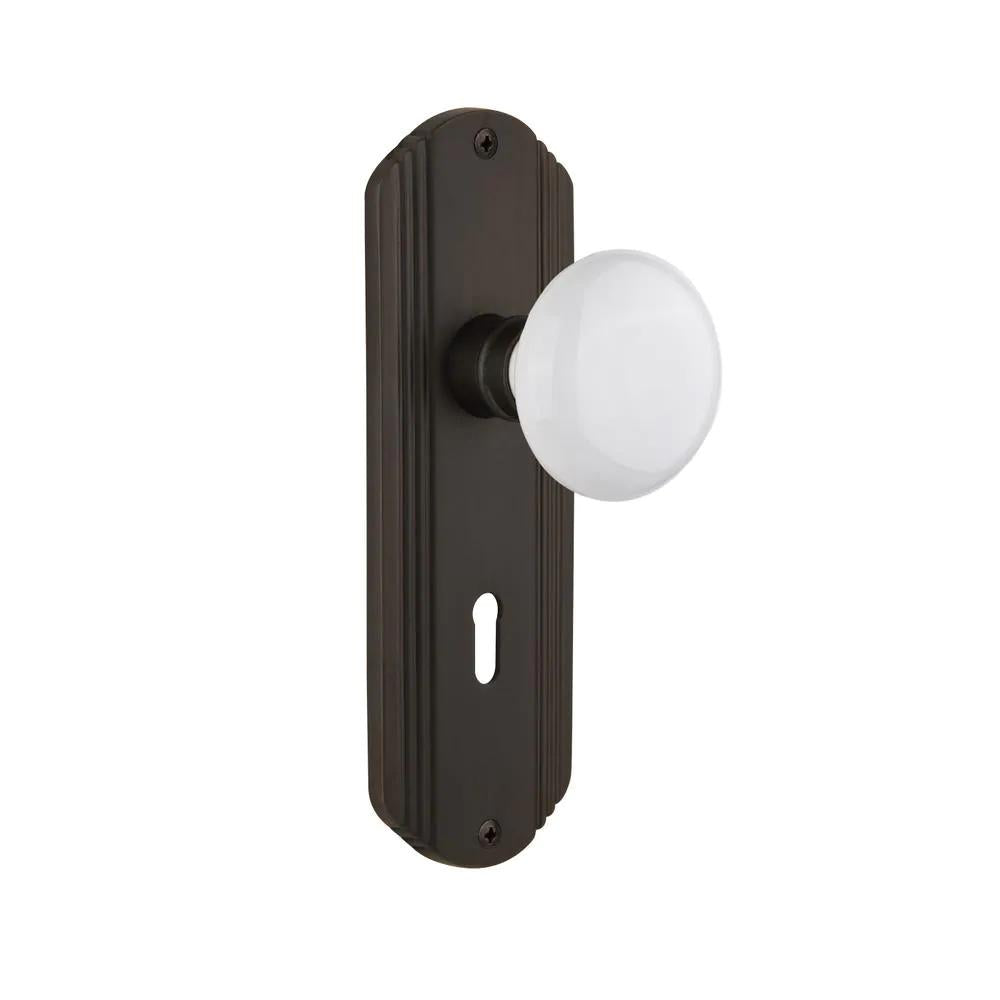 Deco Plate with Keyhole 2-3/8 in. Backset Oil-Rubbed Bronze Privacy Bed/Bath White Porcelain Door Knob