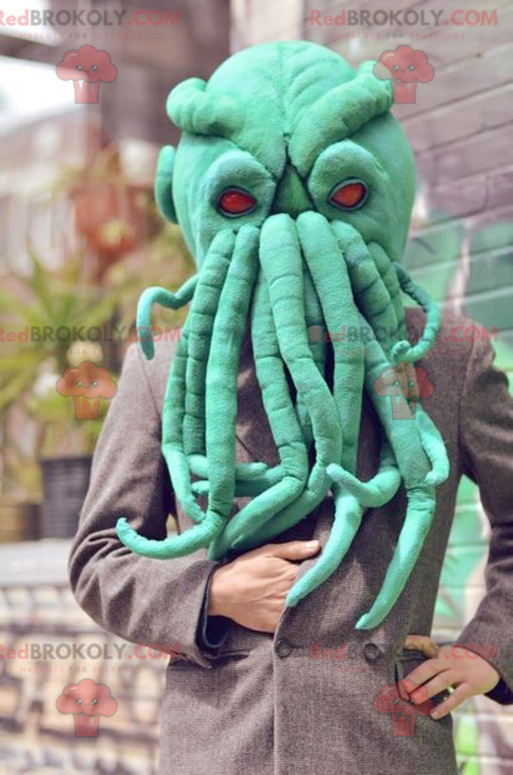 Very realistic green octopus head mascot