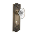 Meadows Plate with Keyhole 2-3/8 in. Backset Antique Brass Privacy Bed/Bath Oval Fluted Crystal Glass Door Knob